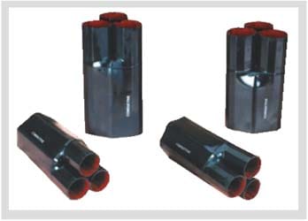 Four black moulded heat-shrink breakouts on a white ground, two upright and two on their side. Each has one wide mouth at one end and a cluster of legs at the other, red mastic visible inside every leg.